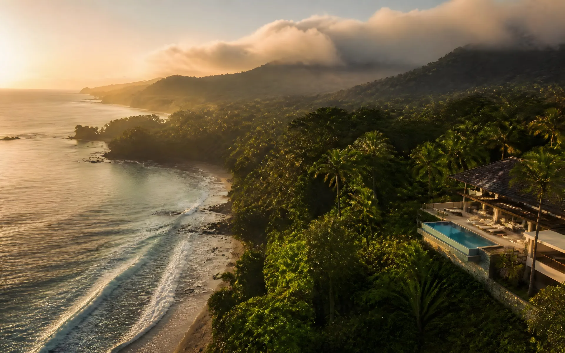 Aerial view of a secluded Costa Rican bay at golden hour